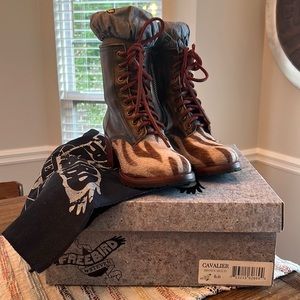 Freebird by Steven sassy leather lace up boot with “zebra” hide on the upper.